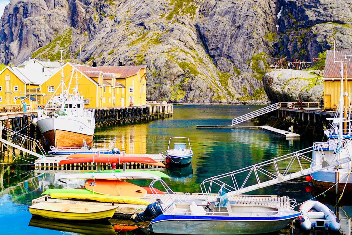 Colorful fishing boats on the shore of Alligator Pond at sunrise