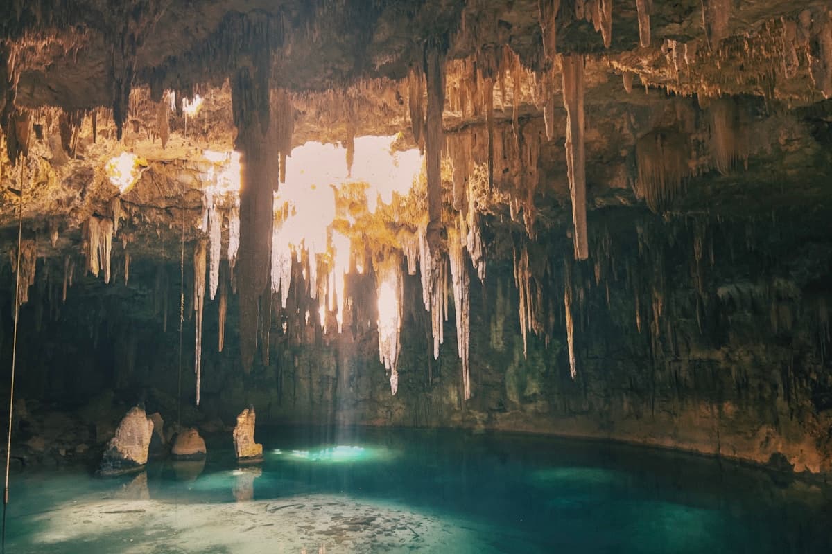 The stunning blue-green waters of Blue Hole surrounded by tropical vegetation
