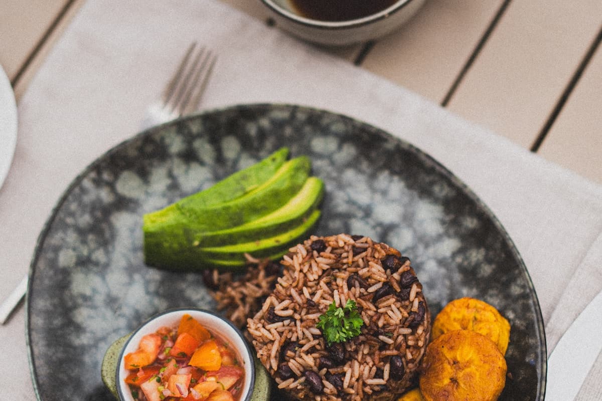 Traditional Jamaican home-cooked meal prepared by Sister Lou